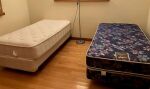 2 single beds with bedding